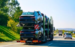 cars-carrier-truck-road-highway-poland-lorry-transporter-logistics-work-trailer-with-cargo-car-drive-delivery-transport-export-industry-heavy-hauler-haul-vehicle-auto-haulage_250132-1437